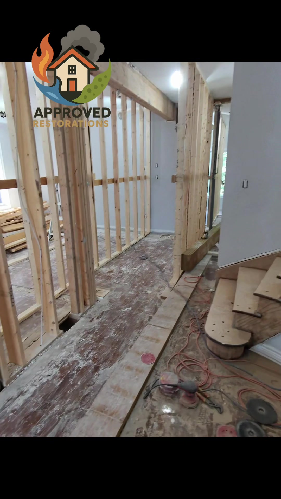 Deep into the reconstruction phase of a major water damage claim at this Vaughan home, our crew has the fresh wall framing locked in and the ruined drywall completely cleared out, dropping power sanders onto the exposed subfloor to prep the footprint before we rebuild this entire space from the studs up.